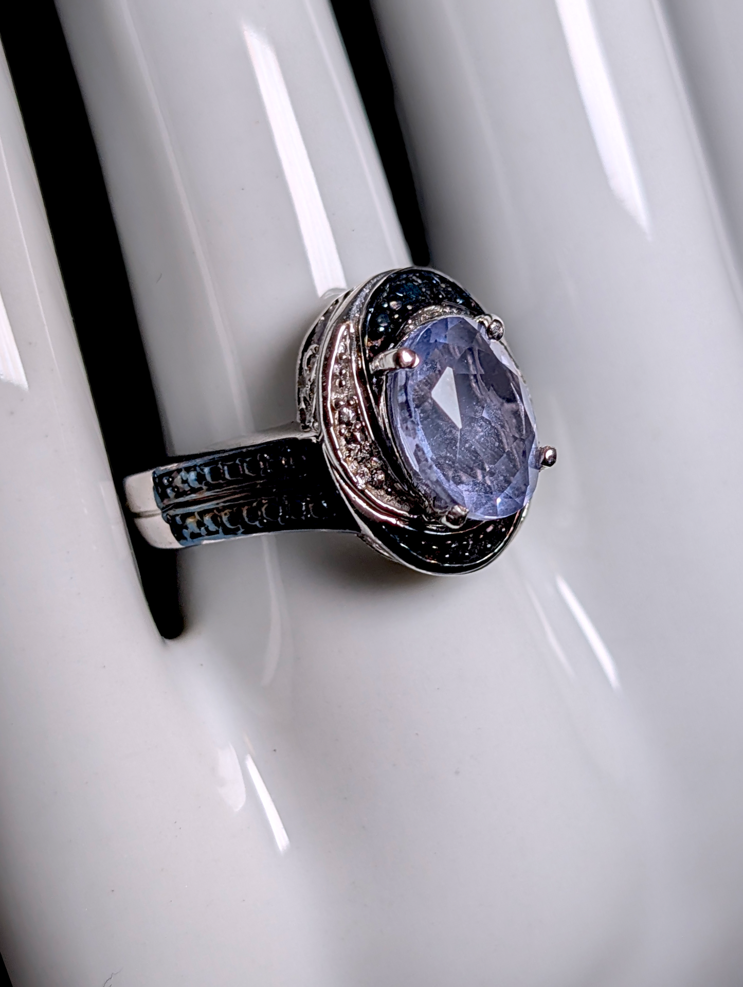 Vintage Inspired Oval Cut Earth Mined Genuine Tanzanite Solitaire Black and White Rhodium Halo over Sterling Silver Ring