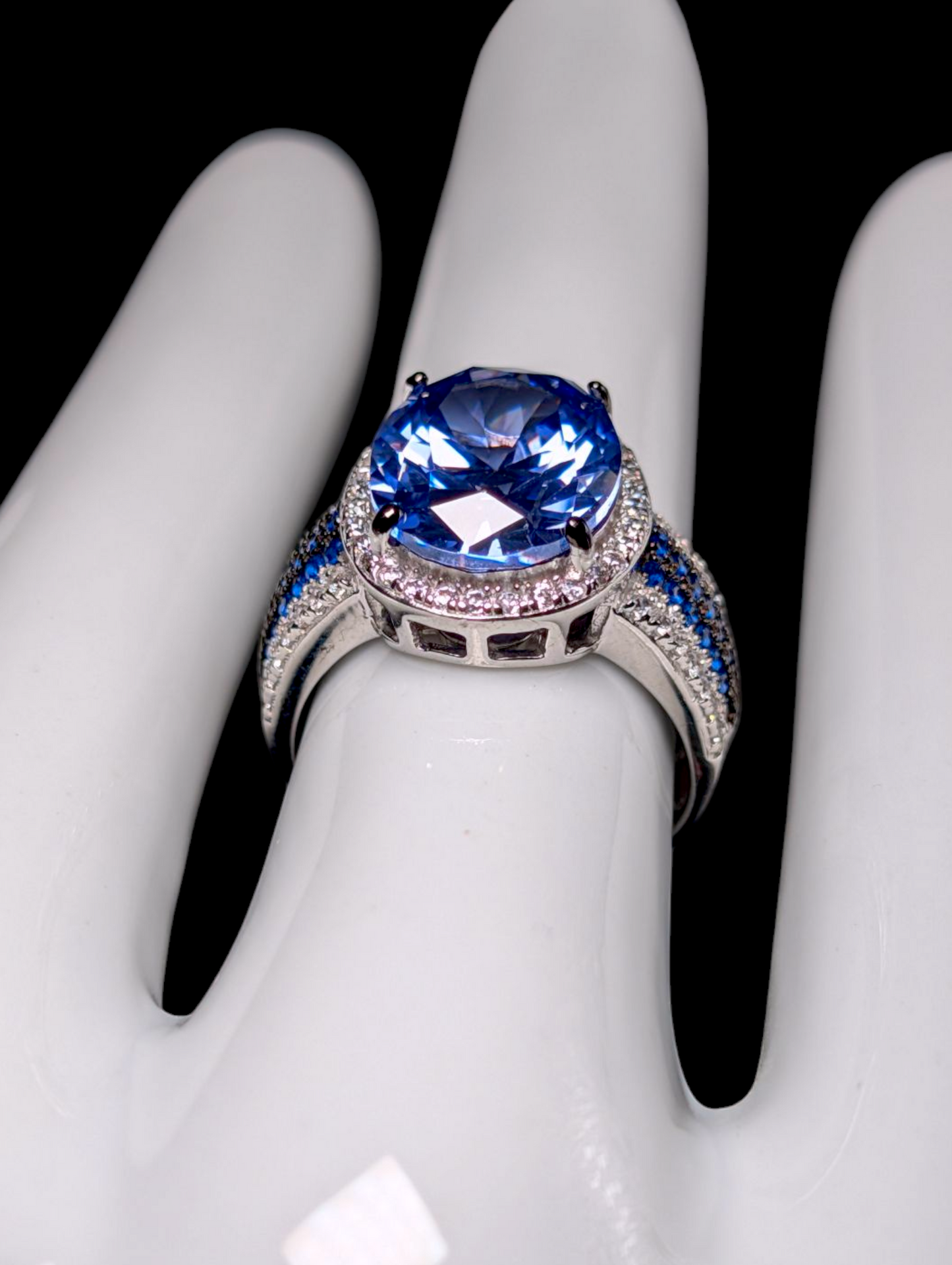 Vintage Inspired Oval Cut Simulated Sapphire with Simulated Diamond Halo Sterling Silver Ring