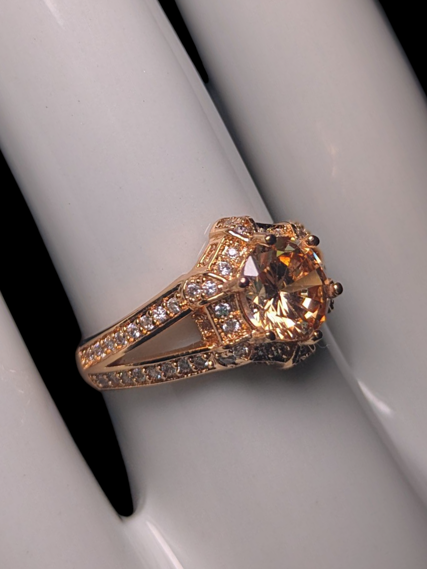 Vintage Inspired Round Cut Simulated Citrine Solitaire with Simulated Diamond Halo and Band Accents Gold Toned Ring