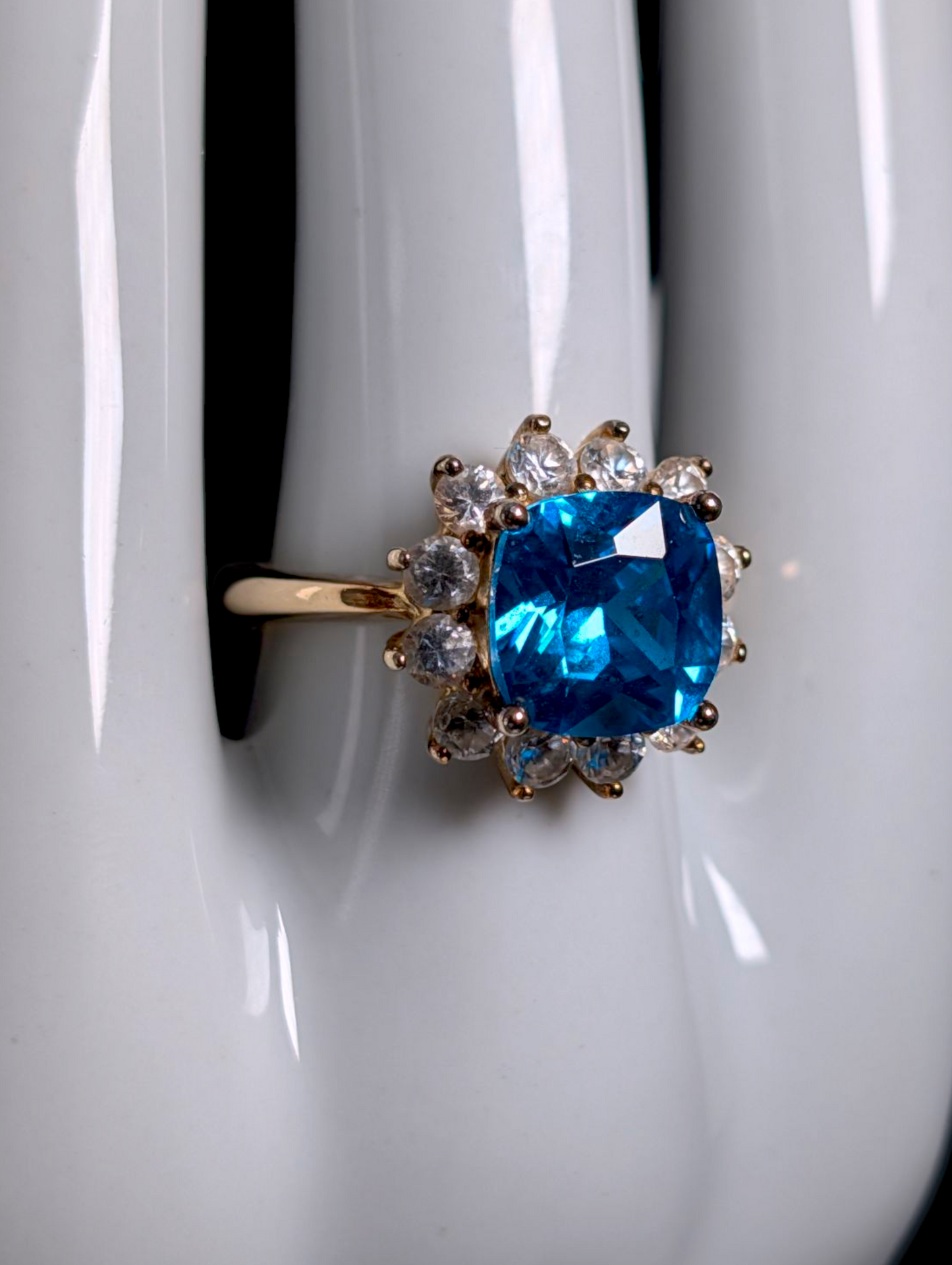 Vintage 1950s Inspired Cushion Cut Simulated Swiss Blue Topaz with Simulated Diamond Starburst Halo Gold over Sterling Cocktail Ring