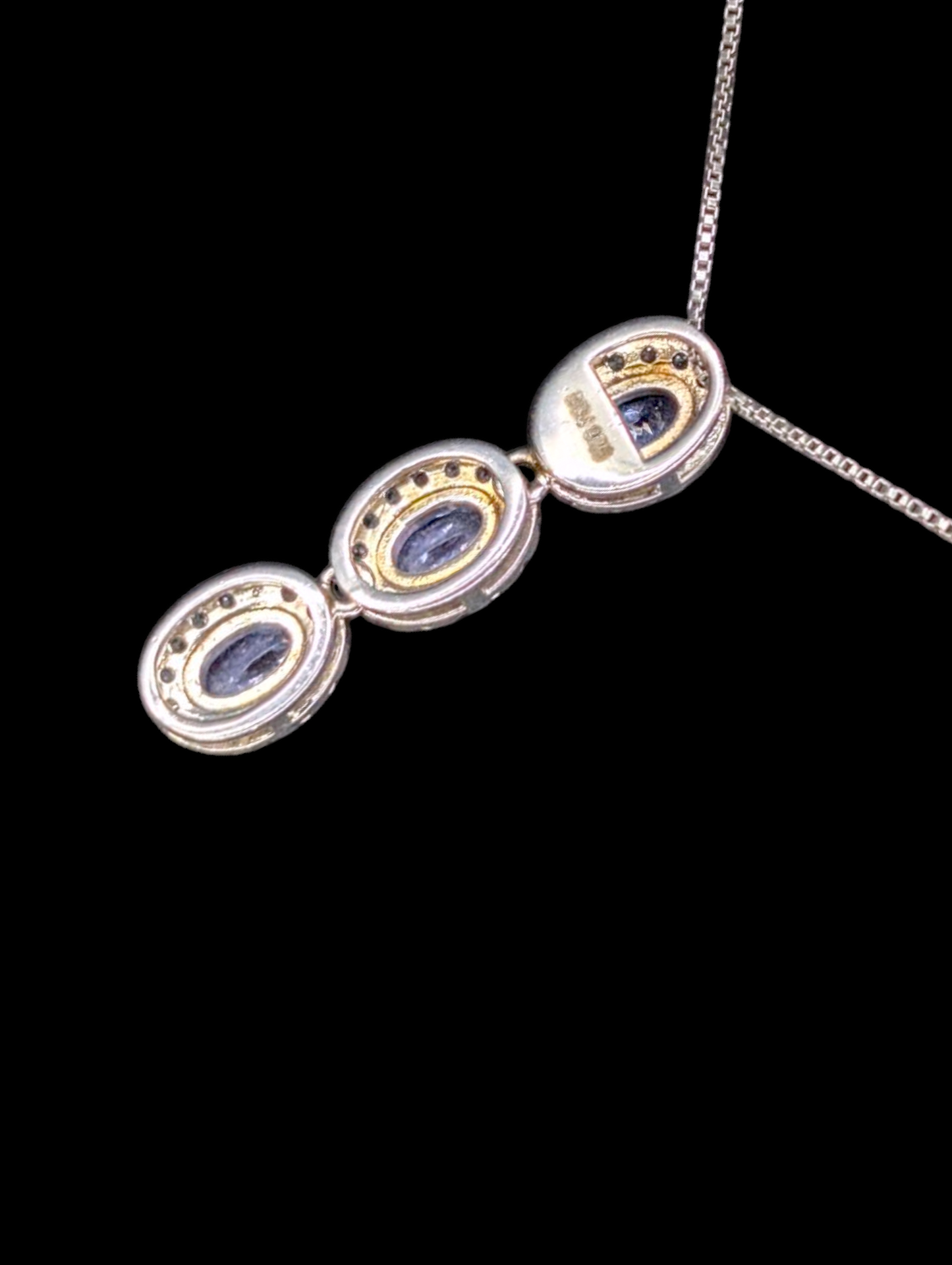 Vintage Inspired Genuine Tanzanite and Zircon Halo Rhodium over Sterling Silver Pendant