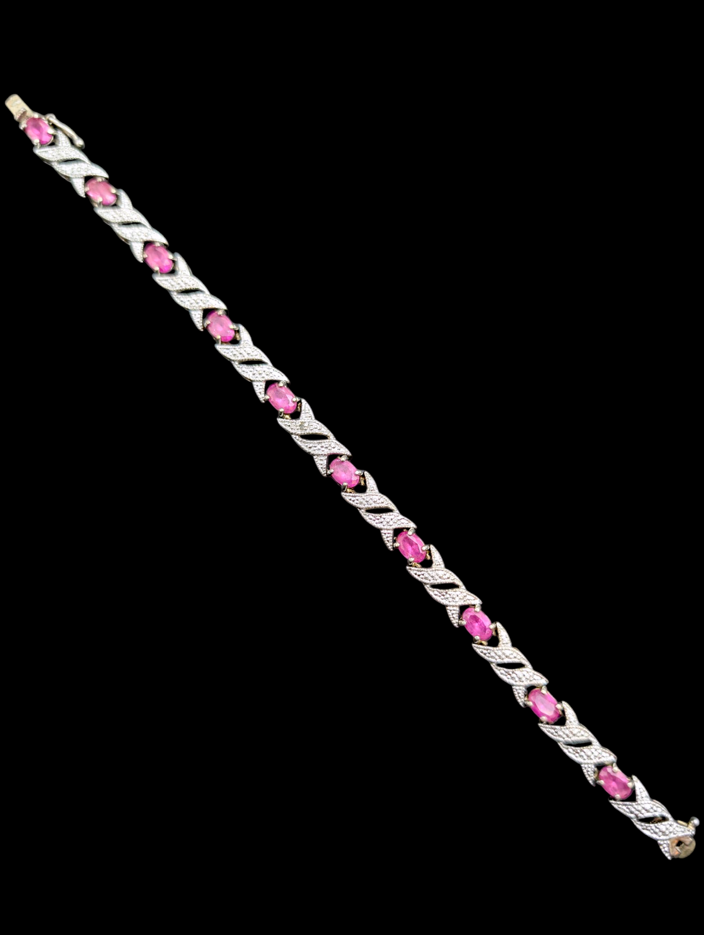 Vintage Oval Cut Genuine Ruby and Diamond Accent Sterling Silver Crossover Infinity Tennis Bracelet