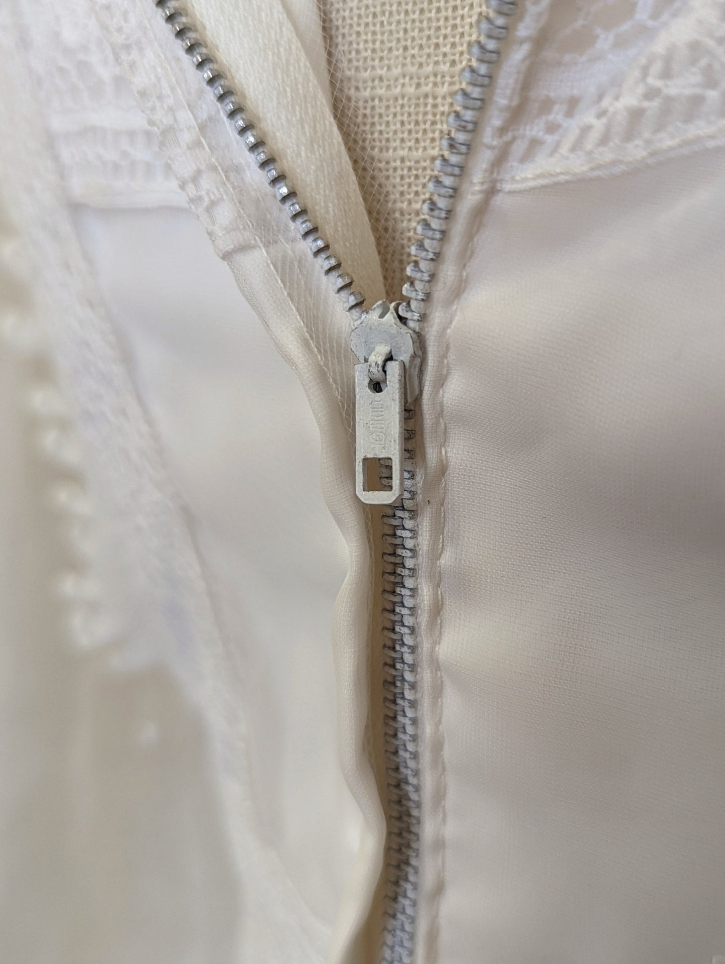 1970s Victorian Revival Bright White Wedding Dress with High Collar, Empire Waist, Lace, and Long Sleeves