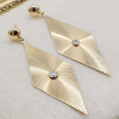 Circa 1970 14K Yellow Gold Fluted Ray Rhombus Earrings With Bezel Set Diamond Accents