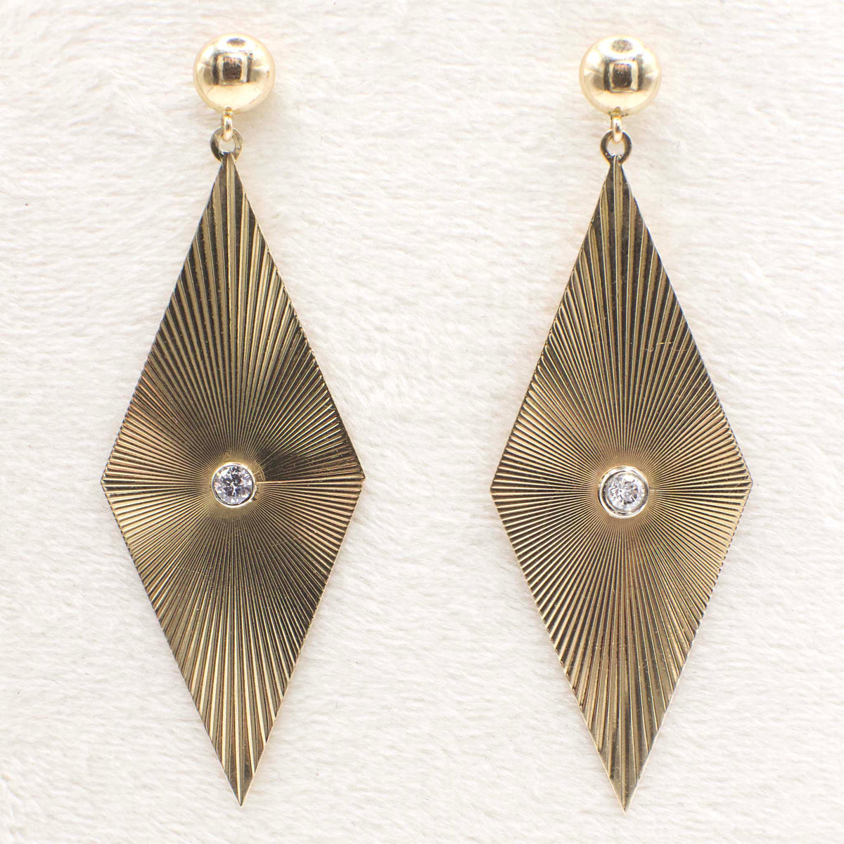 Circa 1970 14K Yellow Gold Fluted Ray Rhombus Earrings With Bezel Set Diamond Accents