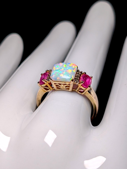 Vintage Princess Cabochon Cut Genuine Opal Solitaire with Oval Cut Pink Ruby Sapphire Accents 18kt Yellow Gold over Sterling Silver Ring