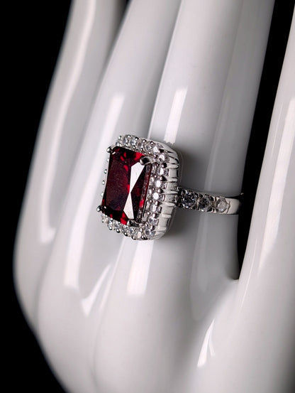 Vintage Inspired Emerald Cut Simulated Garnet Solitaire and Diamond Halo Sterling Silver Ring