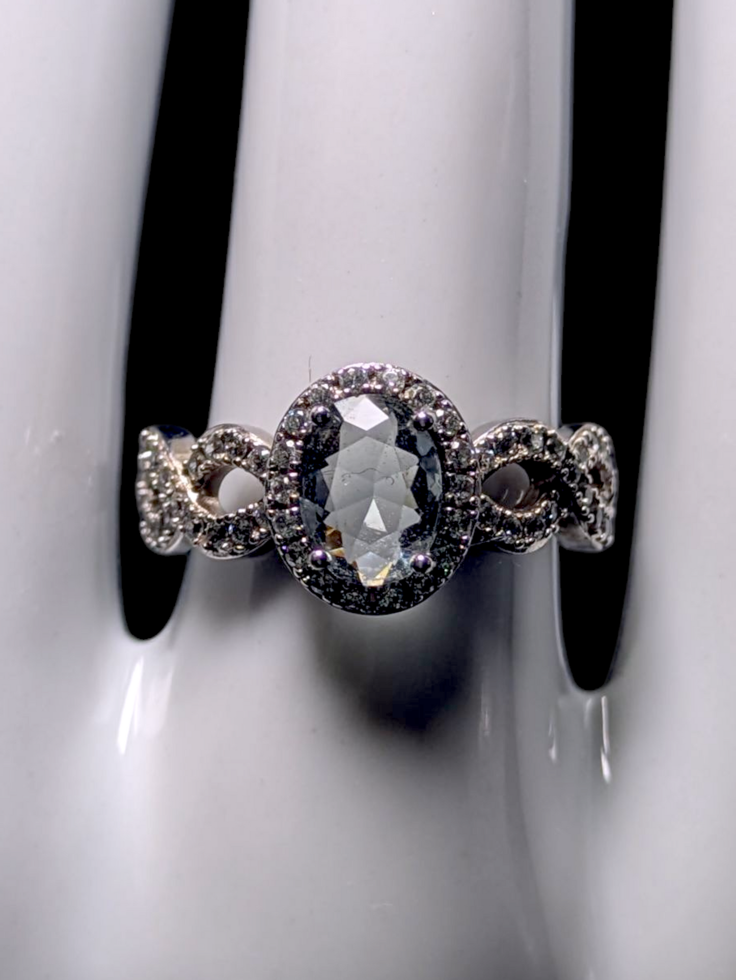Vintage Oval Cut Simulated Smoky Blue Topaz and Simulated Diamond Halo Silver Toned Ring