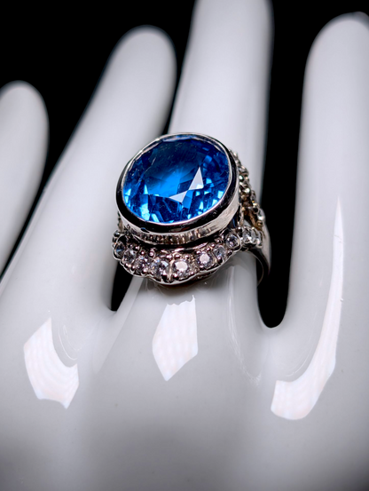 Vintage Large 14 Carat Oval Cut Genuine Swiss Blue Topaz Solitaire with Simulated Diamond Accents Sterling Silver Statement Ring
