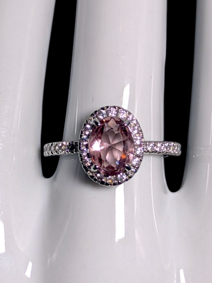 Vintage Inspired Oval Cut Simulated Morganite Solitaire with Simulated Diamond Halo Silver Toned Ring