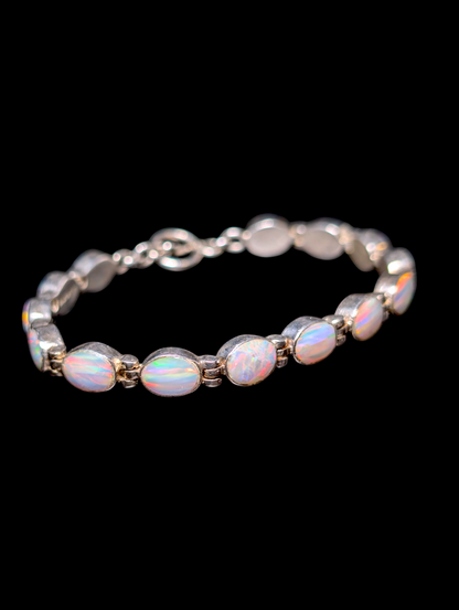 Vintage Oval Cut Bezel Set Genuine Striated Ethiopian Opal Sterling Silver Toggle Bracelet