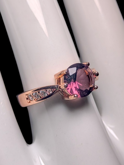 Vintage Inspired Round Cut Simulated Amethyst Solitaire with Simulated Diamond Accents Rose Gold Toned Ring