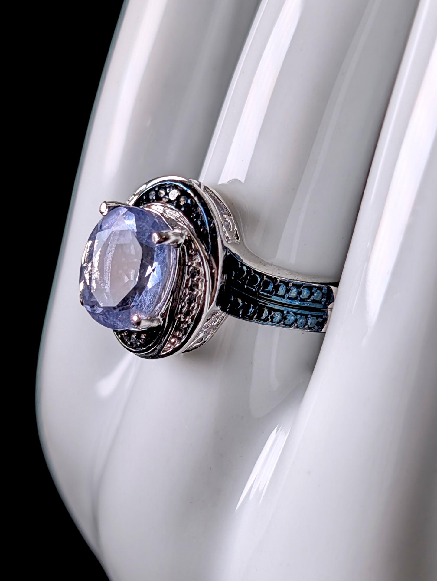 Vintage Inspired Oval Cut Earth Mined Genuine Tanzanite Solitaire Black and White Rhodium Halo over Sterling Silver Ring