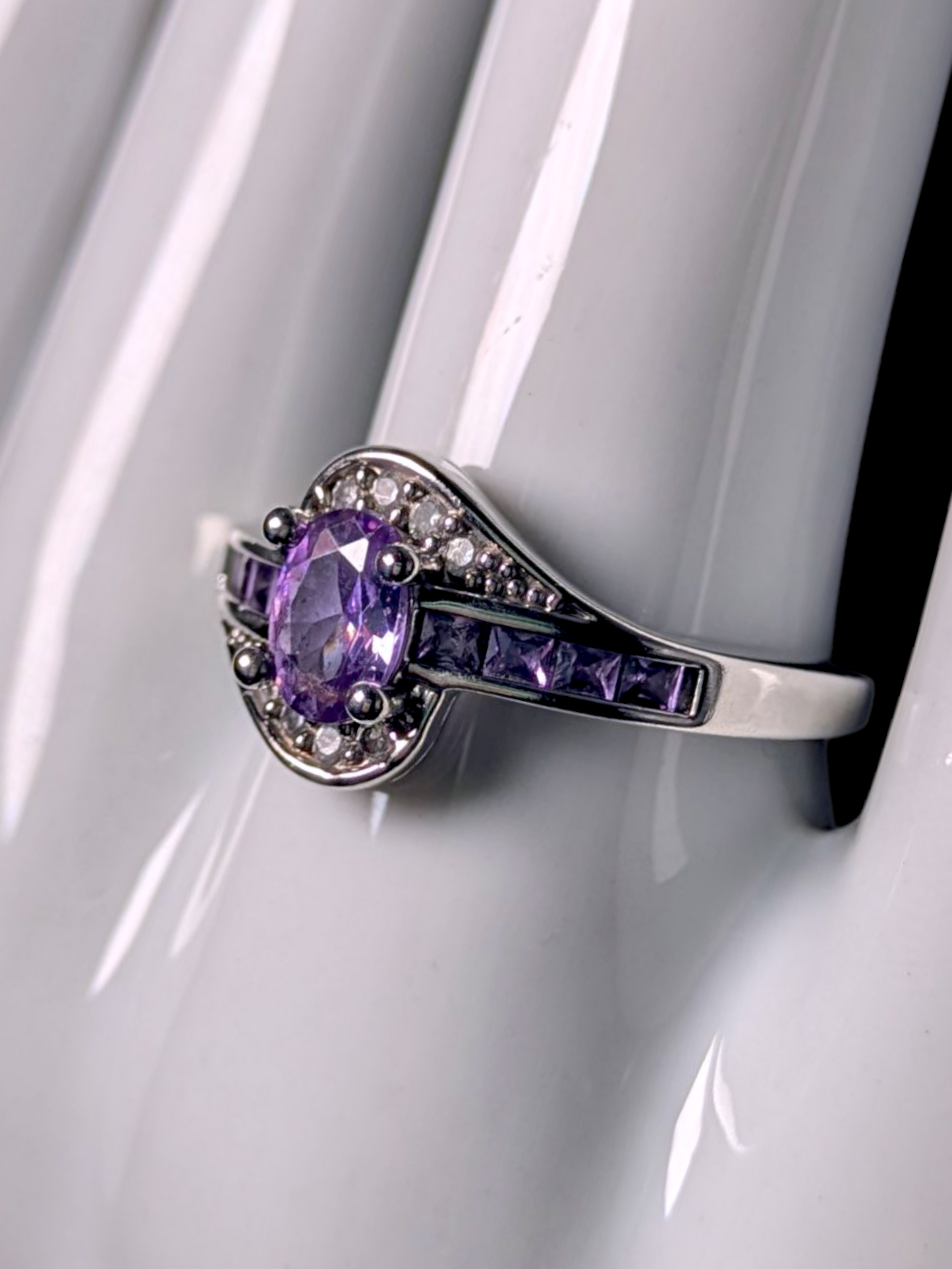 Vintage Oval Cut Simulated Amethyst Solitaire with Simulated Diamond Accents Sterling Silver Cross Over Ring