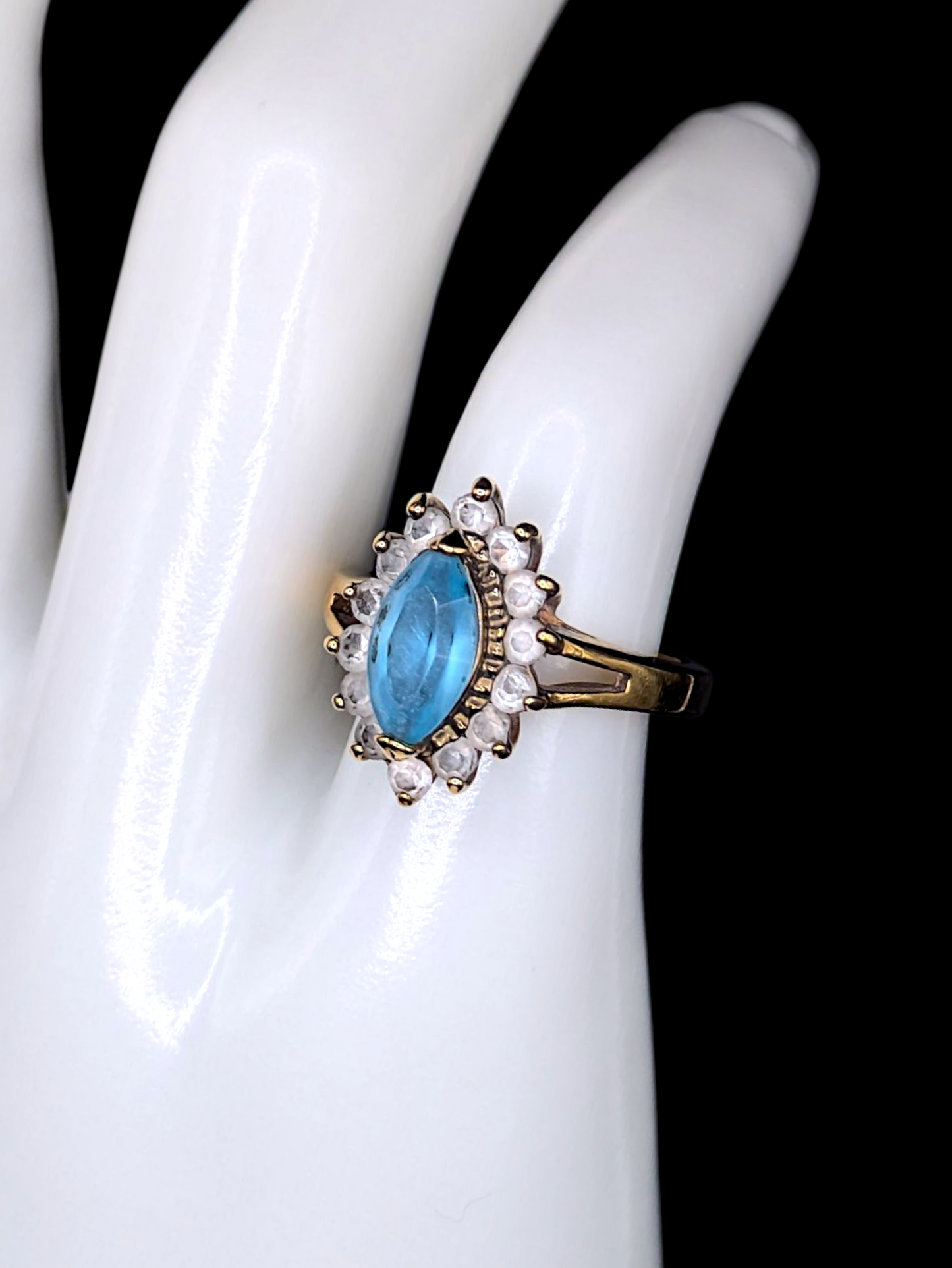 Vintage Marquise Cut Simulated Blue Topaz Solitaire with Simulated Diamond Sunburst Halo Gold Toned Ring