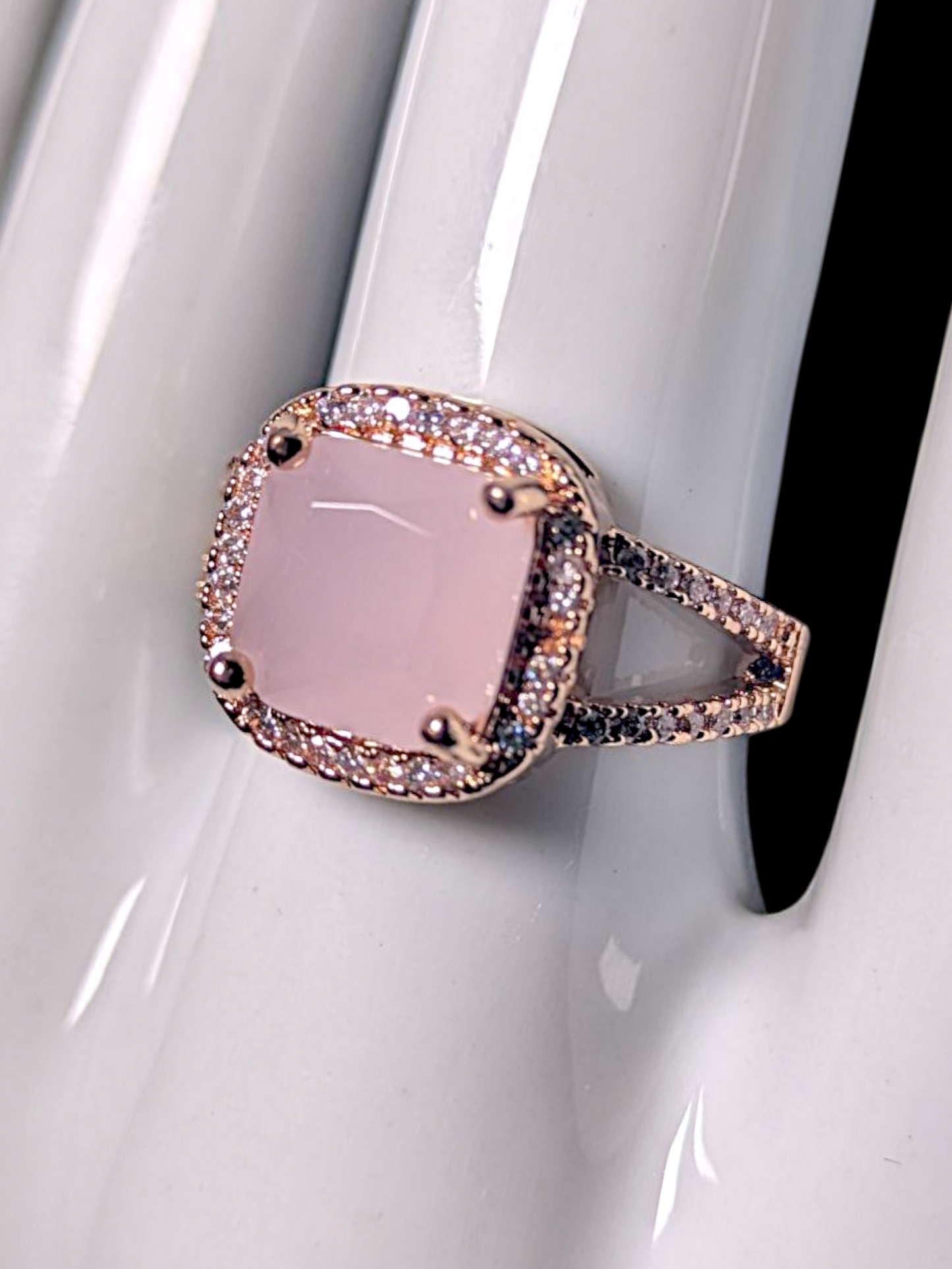 Vintage Inspired Cushion Cut Simulated Rose Quartz Solitaire with Simulated Diamond Halo Rose Gold Toned Ring