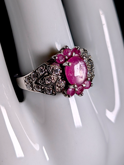 Vintage Inspired Oval Cut Verified Ruby Solitaire and Simulated Diamond Accents Sterling Silver Ring
