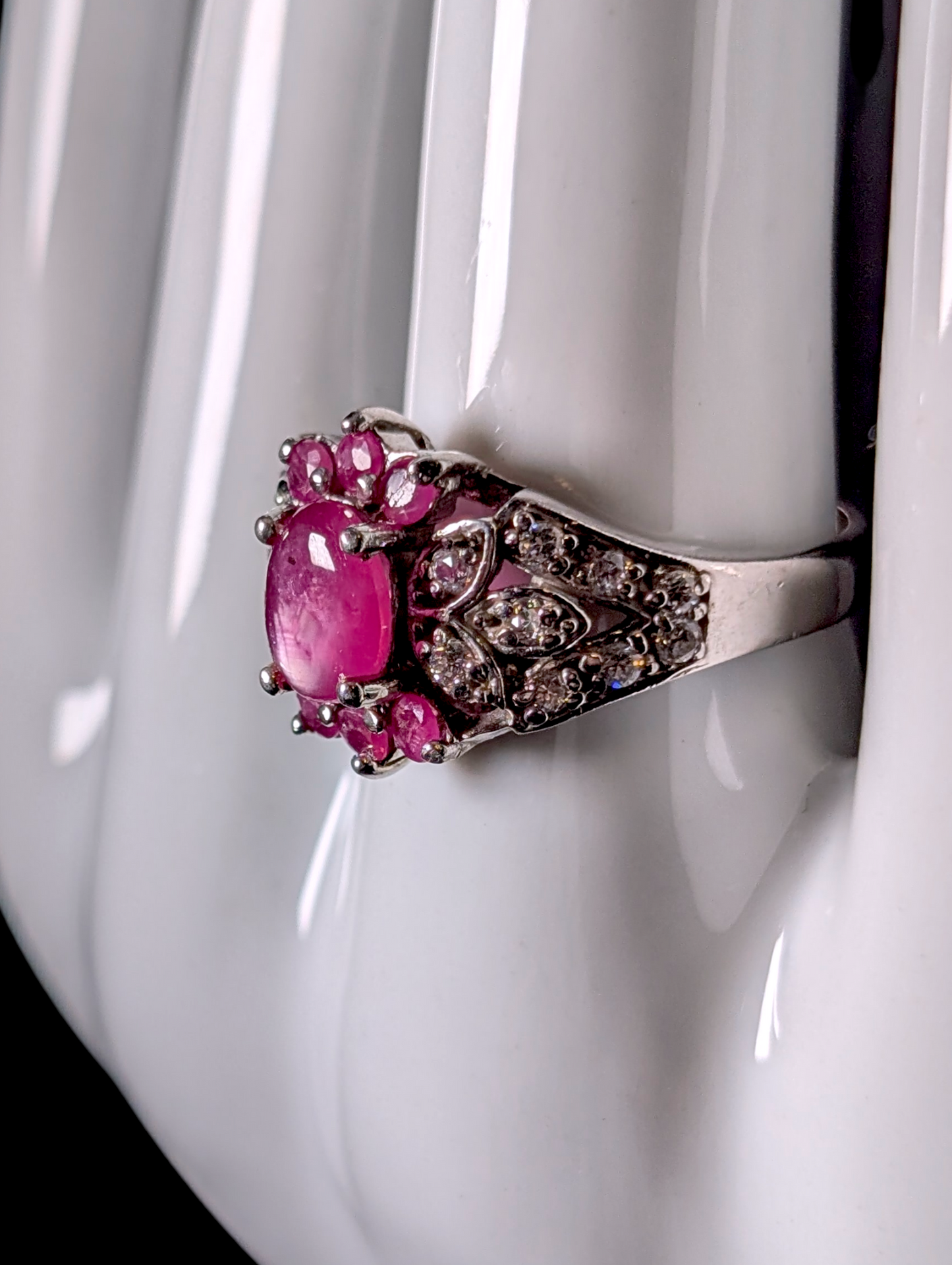 Vintage Inspired Oval Cut Verified Ruby Solitaire and Simulated Diamond Accents Sterling Silver Ring