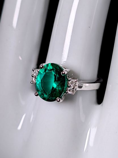 Vintage Inspired Simulated Emerald Solitaire with Simulated Diamond Accents Sterling Silver Ring