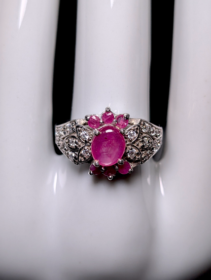 Vintage Inspired Oval Cut Verified Ruby Solitaire and Simulated Diamond Accents Sterling Silver Ring