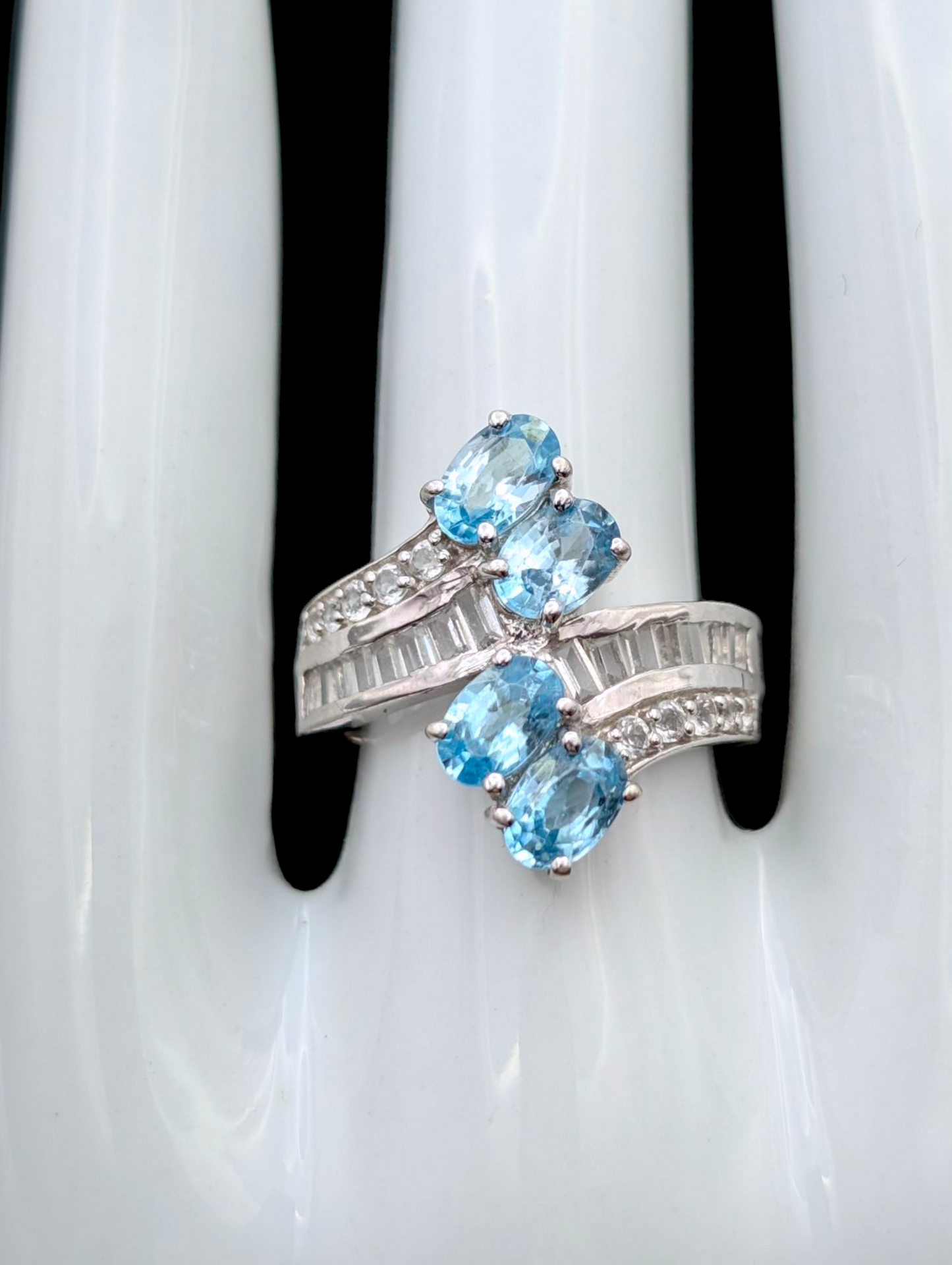 Vintage Wrap Oval Cut Genuine Swiss Blue Topaz and White Topaz Rhodium over Sterling Silver Ring