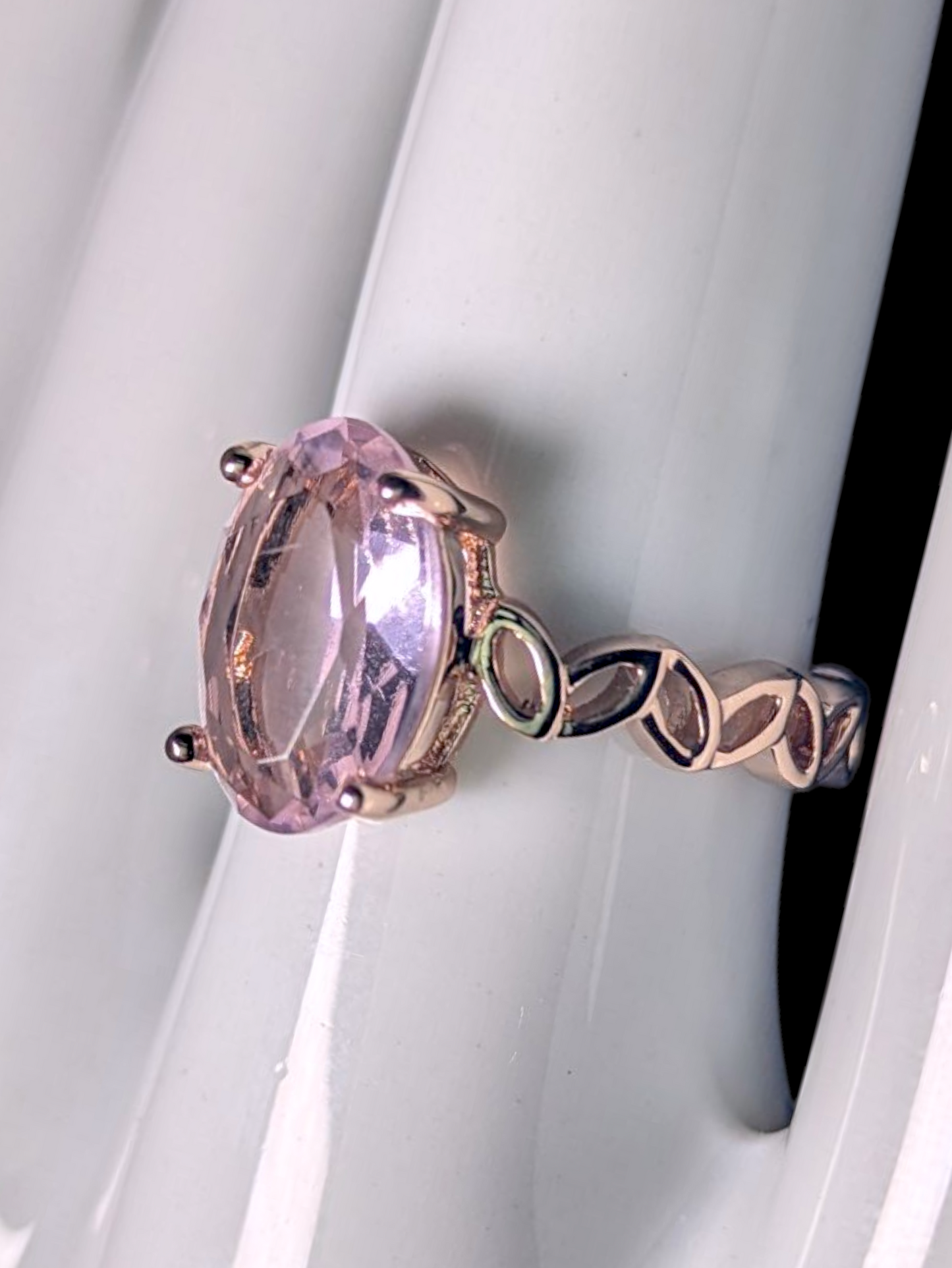 Vintage Inspired Oval Cut Simulated Pink Sapphire Solitaire with Ornate Band Rose Gold Toned Ring