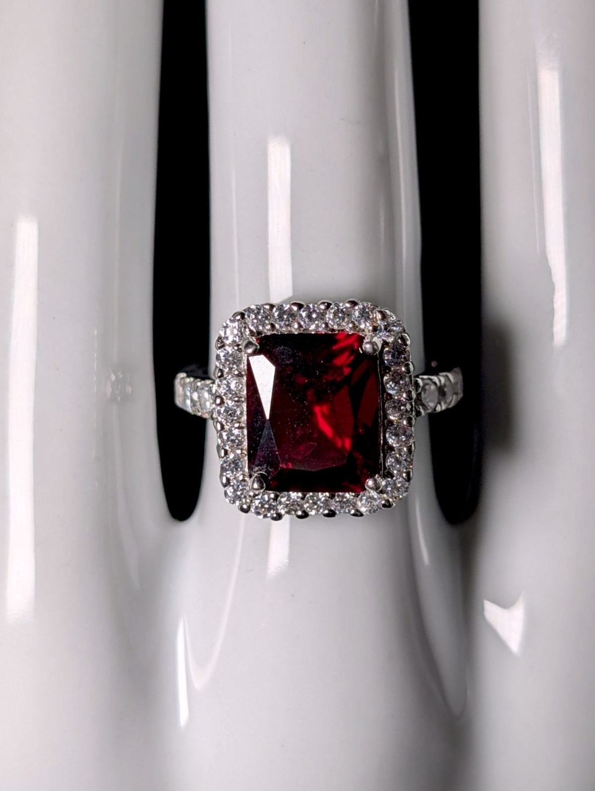 Vintage Inspired Emerald Cut Simulated Garnet Solitaire and Diamond Halo Sterling Silver Ring