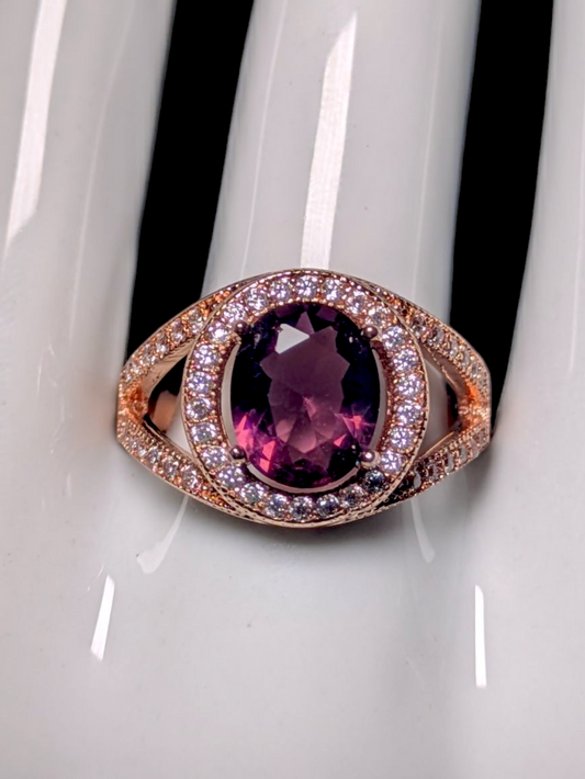 Vintage Inspired Oval Cut Simulated Amethyst with Simulated Diamond Halo Rose Gold Toned Statement Ring