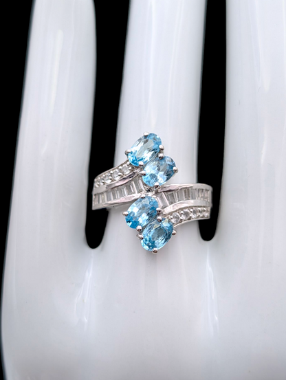 Vintage Wrap Oval Cut Genuine Swiss Blue Topaz and White Topaz Rhodium over Sterling Silver Ring