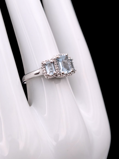 Vintage Emerald Cut Three Stone Genuine Aquamarine and Diamond Accented Halo Sterling Silver Ring