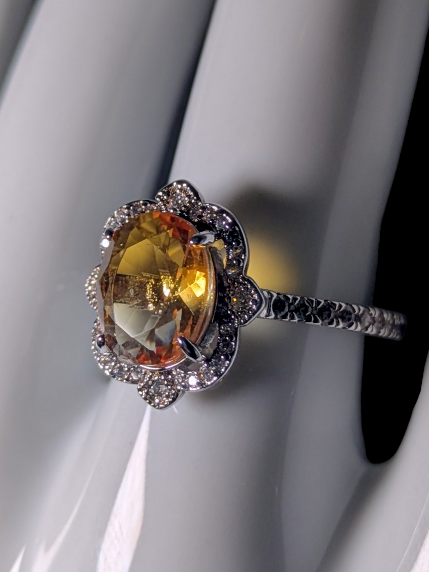 Vintage Inspired Oval Cut Simulated Citrine Solitaire with Simulated Diamond Ornate Halo Silver Toned Ring