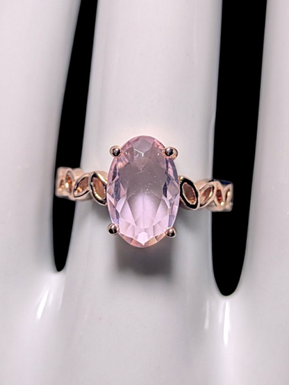 Vintage Inspired Oval Cut Simulated Pink Sapphire Solitaire with Ornate Band Rose Gold Toned Ring