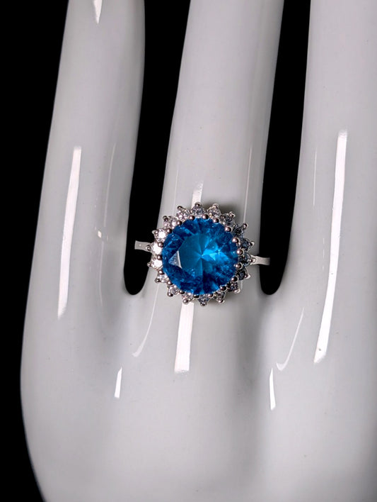Vintage Inspired Round Cut Simulated Topaz Solitaire and Diamond Halo Sterling Silver Ring