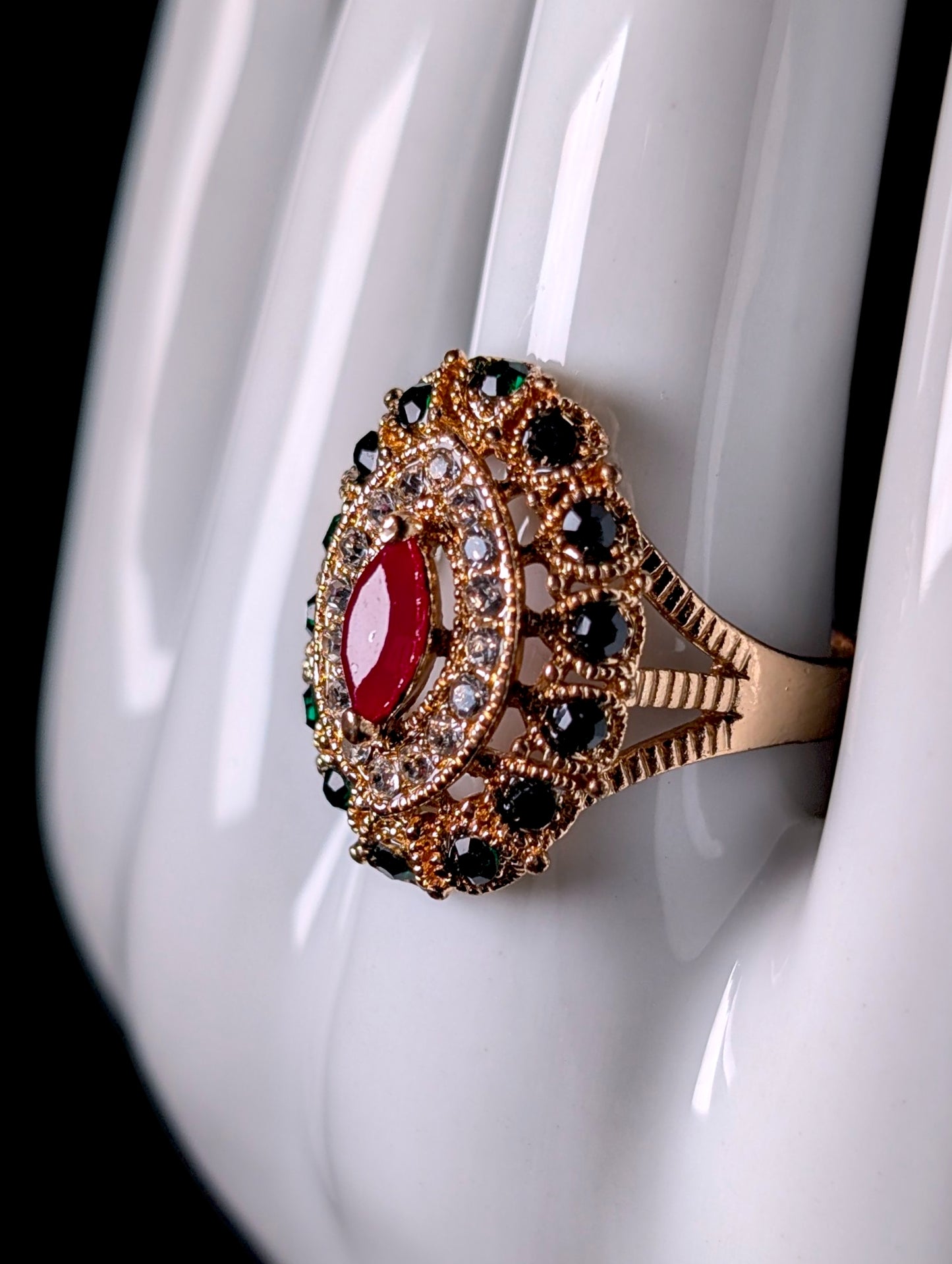 Vintage Simulated Ruby Solitaire with Emerald and Diamond Halo Gold Toned Ring
