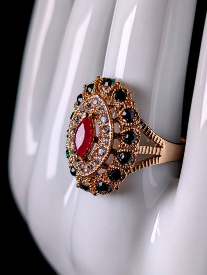 Vintage Simulated Ruby Solitaire with Emerald and Diamond Halo Gold Toned Ring