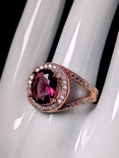 Vintage Inspired Oval Cut Simulated Amethyst with Simulated Diamond Halo Rose Gold Toned Statement Ring