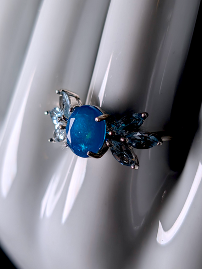 Vintage Oval Cut Genuine Blue Opal Solitaire with Sky Blue Topaz Wing Accent Stones Sterling Silver Ring