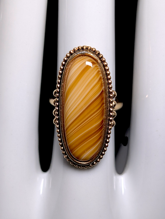 Vintage 1970s Avon Oval Cut Simulated Swirled Caramel Butterscotch Agate Solitaire Gold Toned Ring