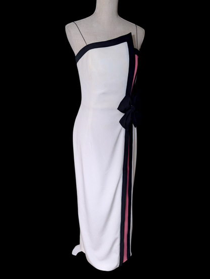 1980s Couture Designer Bill Blass White and Black Hourglass Evening Dress with Hot Pink Color Blocking, Asymmetrical Neckline, Decorative Accent Bow and Spaghetti Straps
