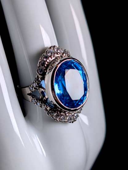 Vintage Large 14 Carat Oval Cut Genuine Swiss Blue Topaz Solitaire with Simulated Diamond Accents Sterling Silver Statement Ring