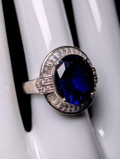 Vintage Inspired Large Oval Cut Genuine Blue Sapphire and White Sapphire Halo with White Zircon Accent Stones Sterling Silver Ring