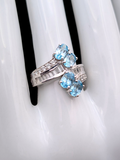 Vintage Wrap Oval Cut Genuine Swiss Blue Topaz and White Topaz Rhodium over Sterling Silver Ring