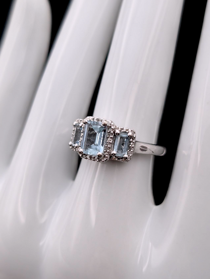 Vintage Emerald Cut Three Stone Genuine Aquamarine and Diamond Accented Halo Sterling Silver Ring