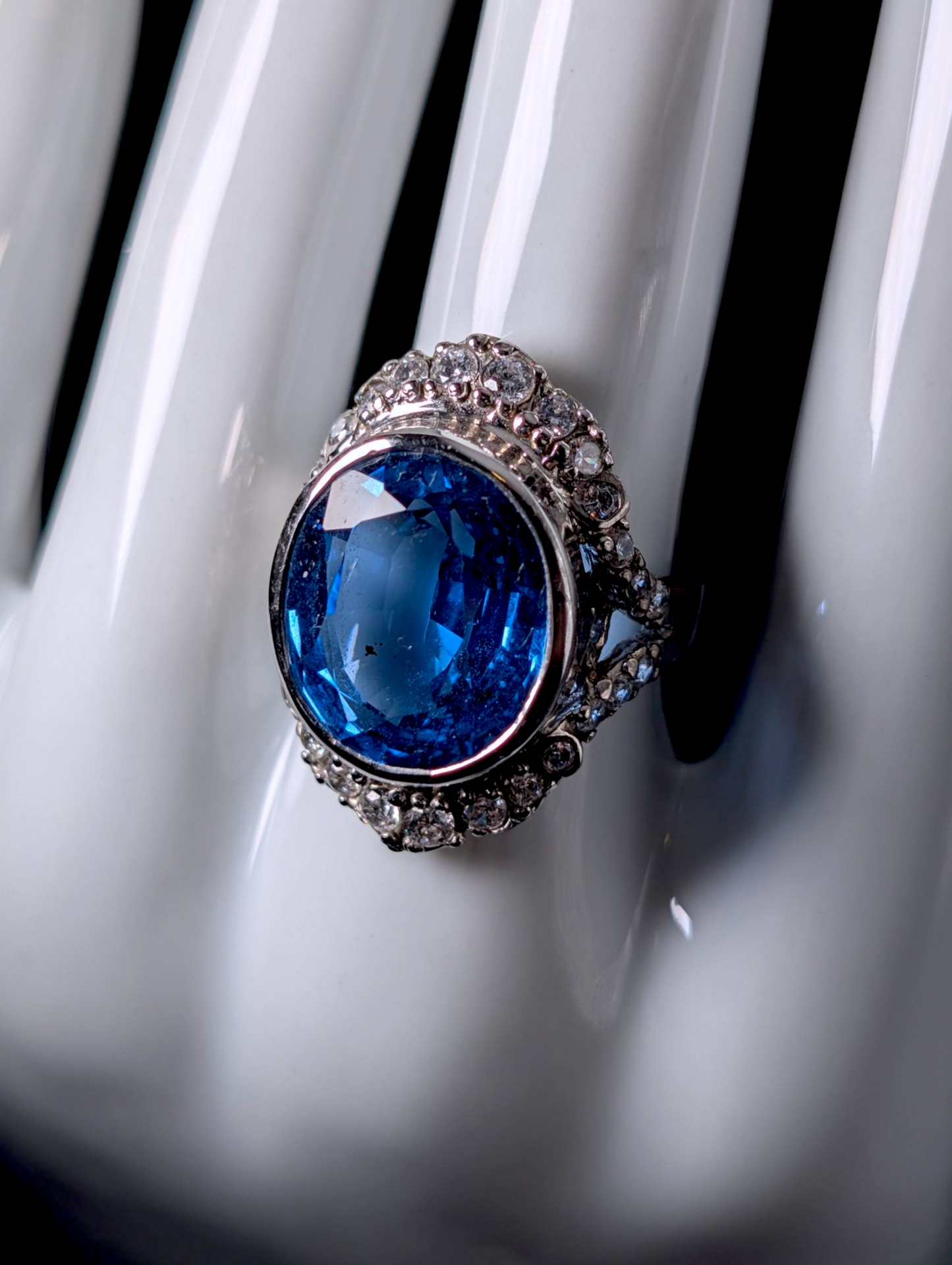Vintage Large 14 Carat Oval Cut Genuine Swiss Blue Topaz Solitaire with Simulated Diamond Accents Sterling Silver Statement Ring