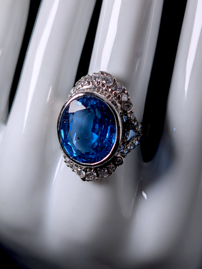 Vintage Large 14 Carat Oval Cut Genuine Swiss Blue Topaz Solitaire with Simulated Diamond Accents Sterling Silver Statement Ring