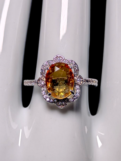 Vintage Inspired Oval Cut Simulated Citrine Solitaire with Simulated Diamond Ornate Halo Silver Toned Ring