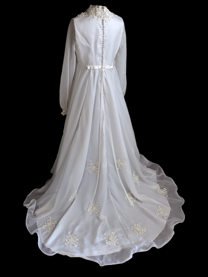 1970s Passion Flower Lace Column Wedding Dress with Long Sleeves. Trailing Ribbon, Empire Waist and Bustle Train